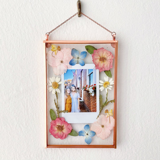 A polaroid pressed flower frame with for Mother's Day gift.