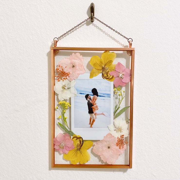 A pressed flower polaroid floating frame with a picture of a couple. Valentine's day gift for her.