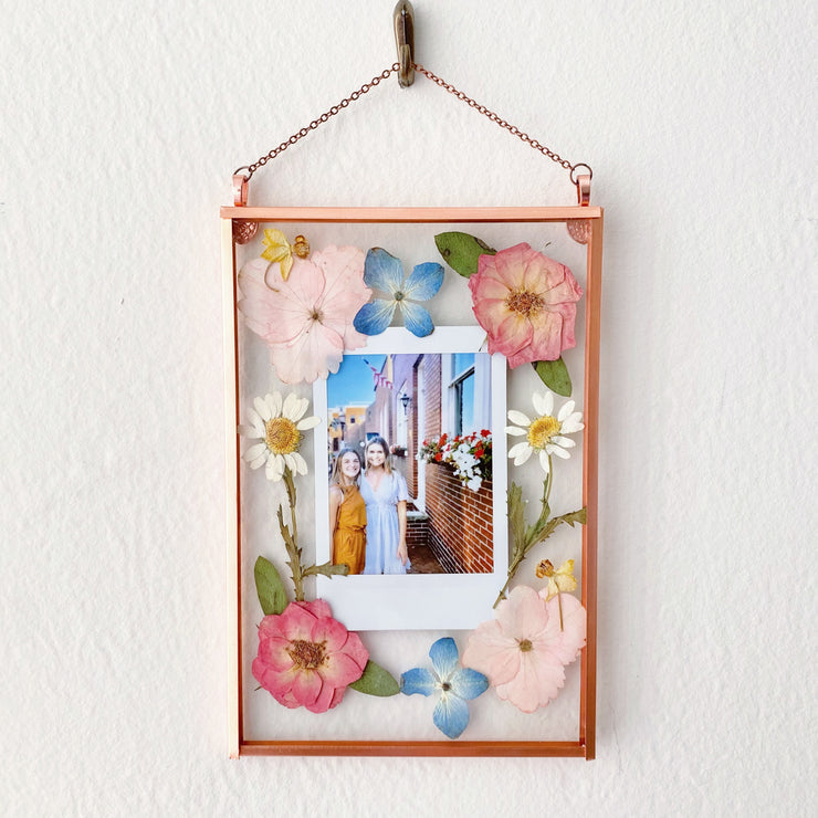 A polaroid pressed flower frame with for Mother's Day gift.